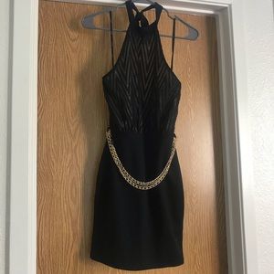 Tiny black & cream dress.
